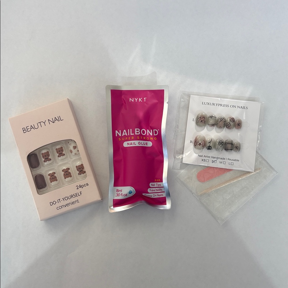 2 Sets of Press-On Nails Sets Plus Nail Glue